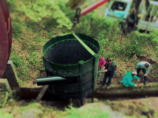 Placement of the KCT micro hydropower turbine during installation